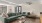 a living room with a green couch
