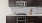 a kitchen with black cabinets