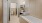 a bathroom with a tub and sink