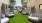 a courtyard with chairs and pods